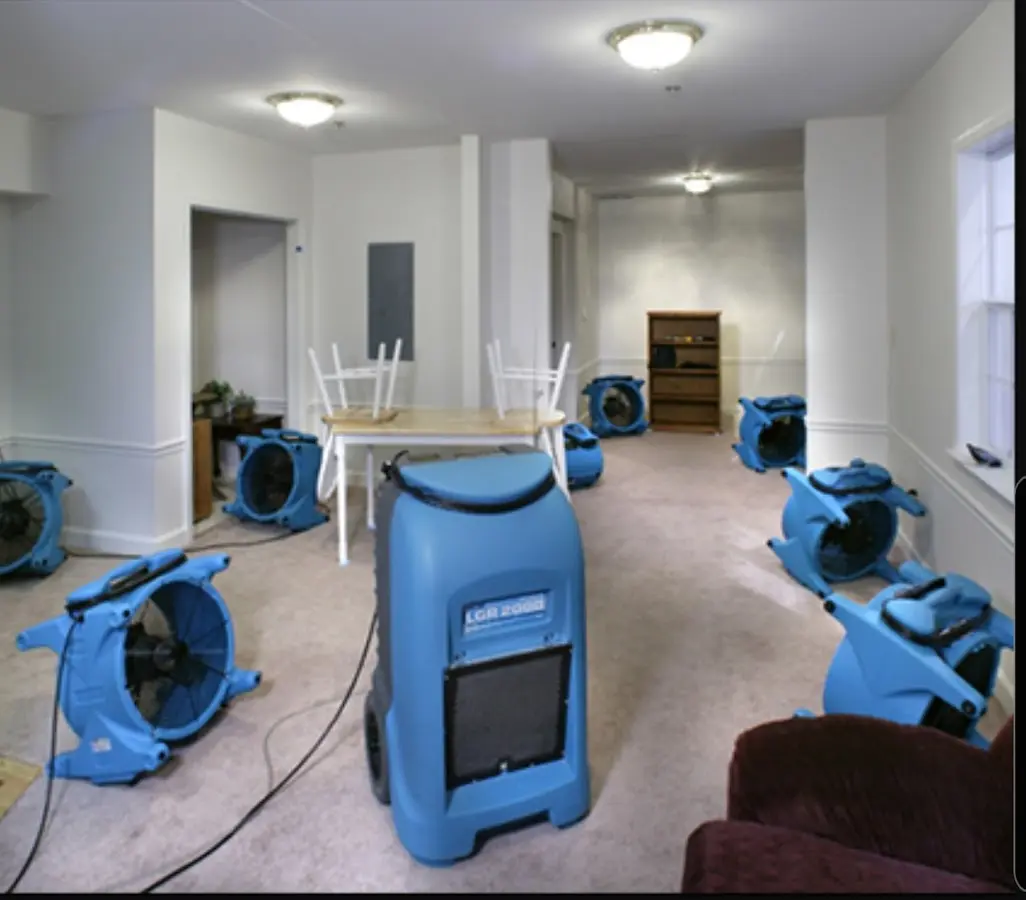 Air movers and dehumidifier setup for Water Damage Restoration in Warren